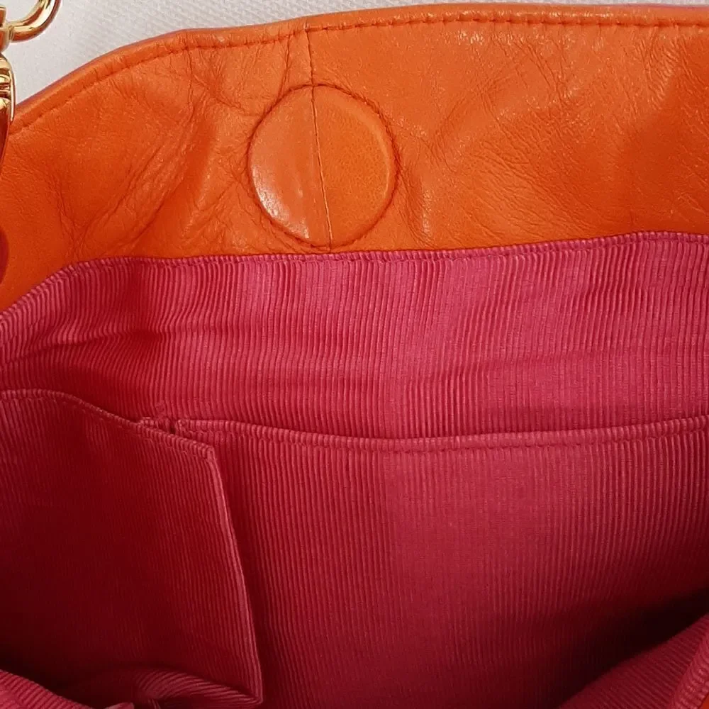 Pink and orange leathershoulder handbag